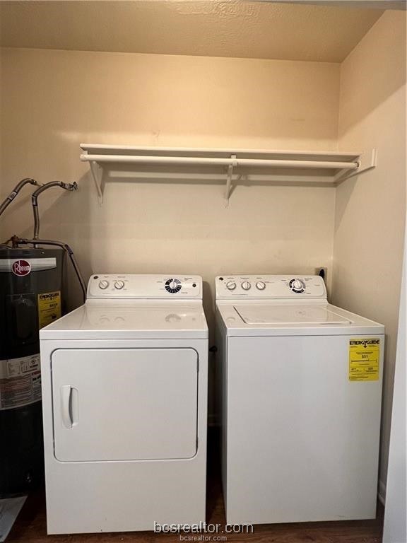 906 Spring Loop, Unit D College Station, TX 77840 - Photo 8 of 11 a utility room with dryer and washer