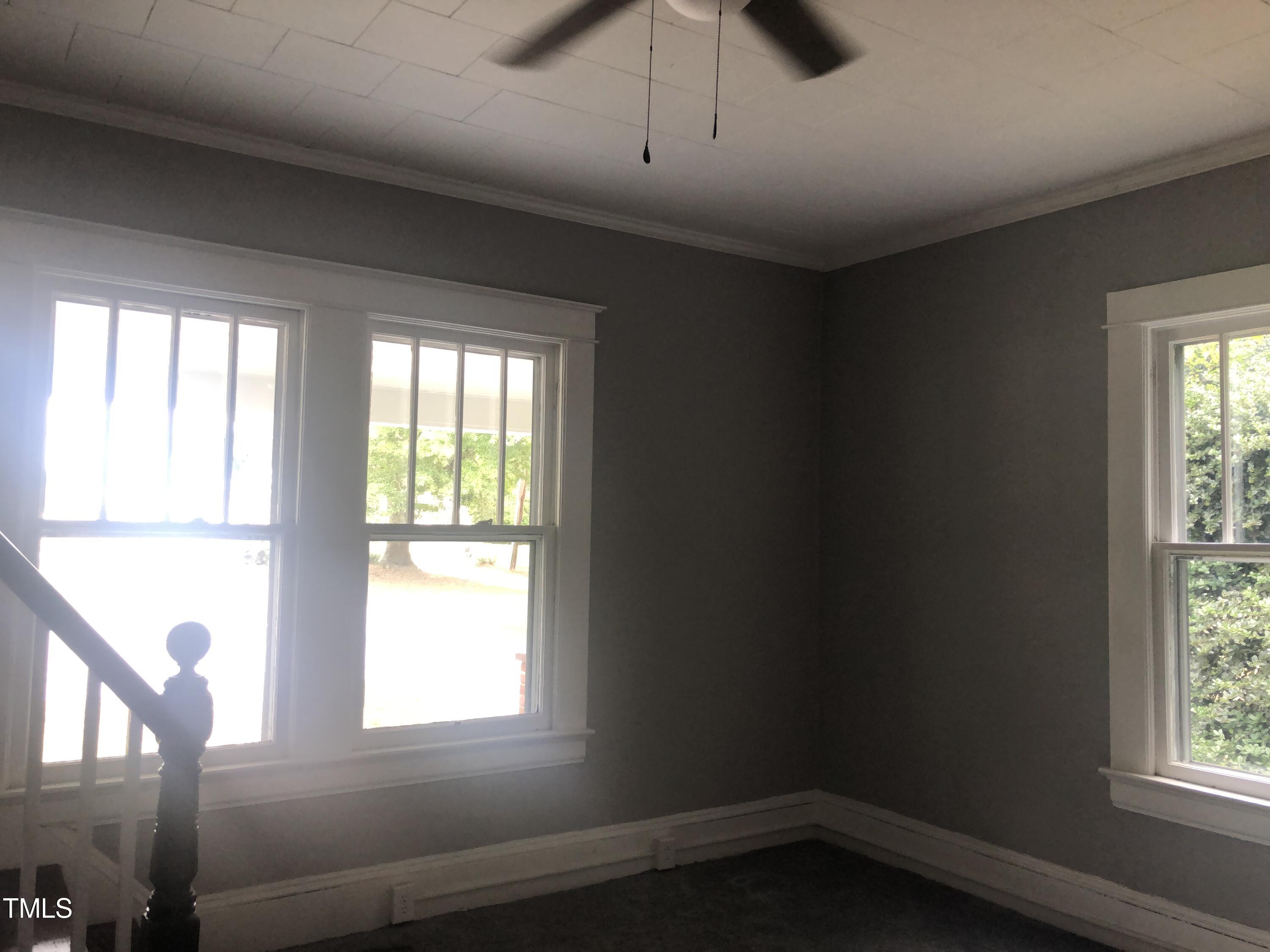 3124 Raleigh Road Henderson, NC 27537 - Photo 13 of 18 a view of an empty room with a window
