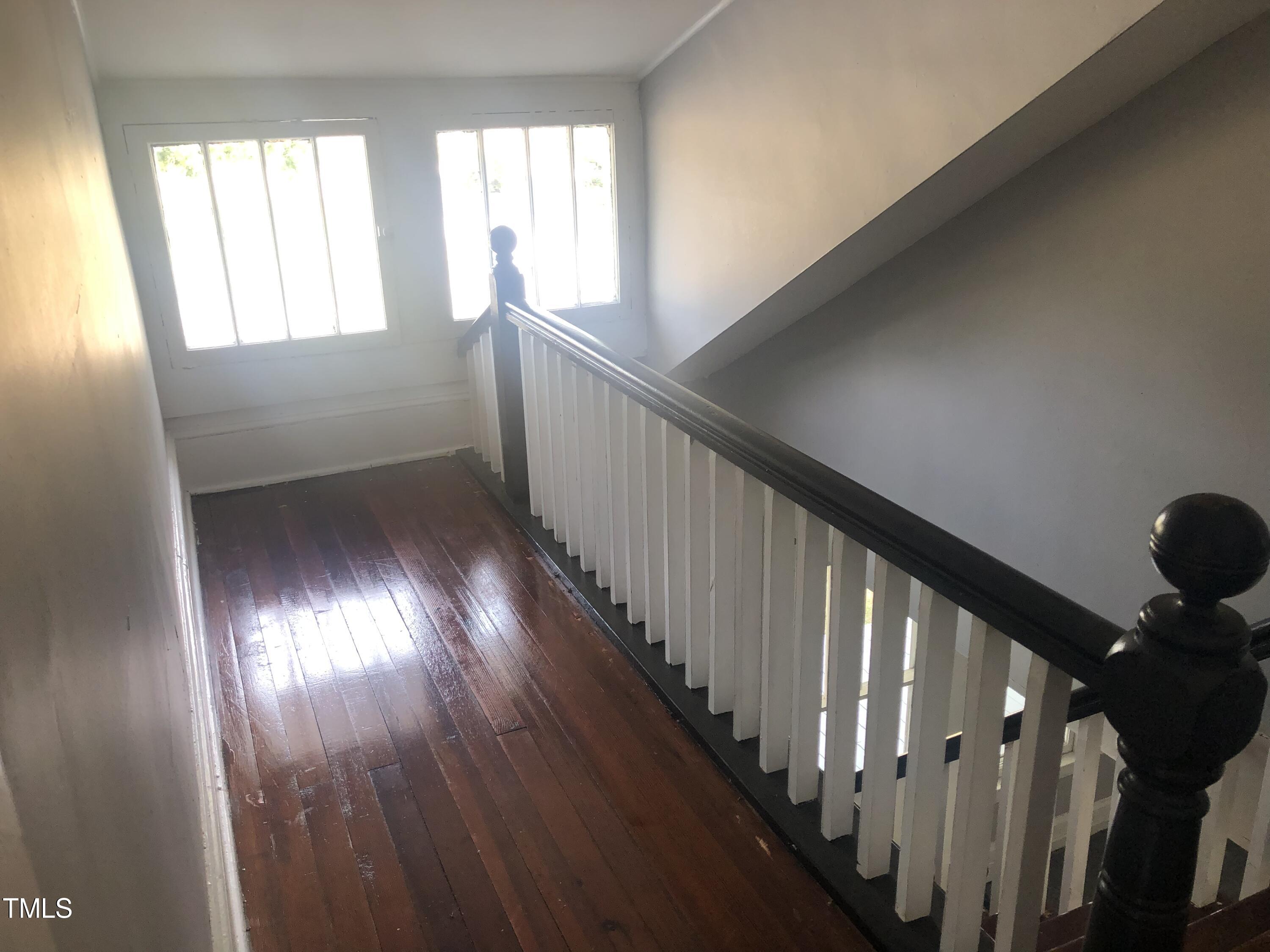 3124 Raleigh Road Henderson, NC 27537 - Photo 18 of 18 a view of an entryway with wooden floor