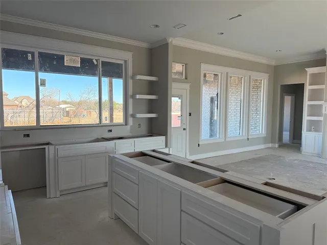 a room with a sink and a window