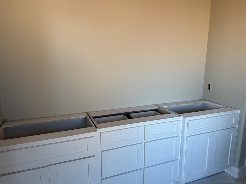 232 Wild Rye Road Abilene, TX 79606 - Photo 10 of 10 a utility room with dryer and washer