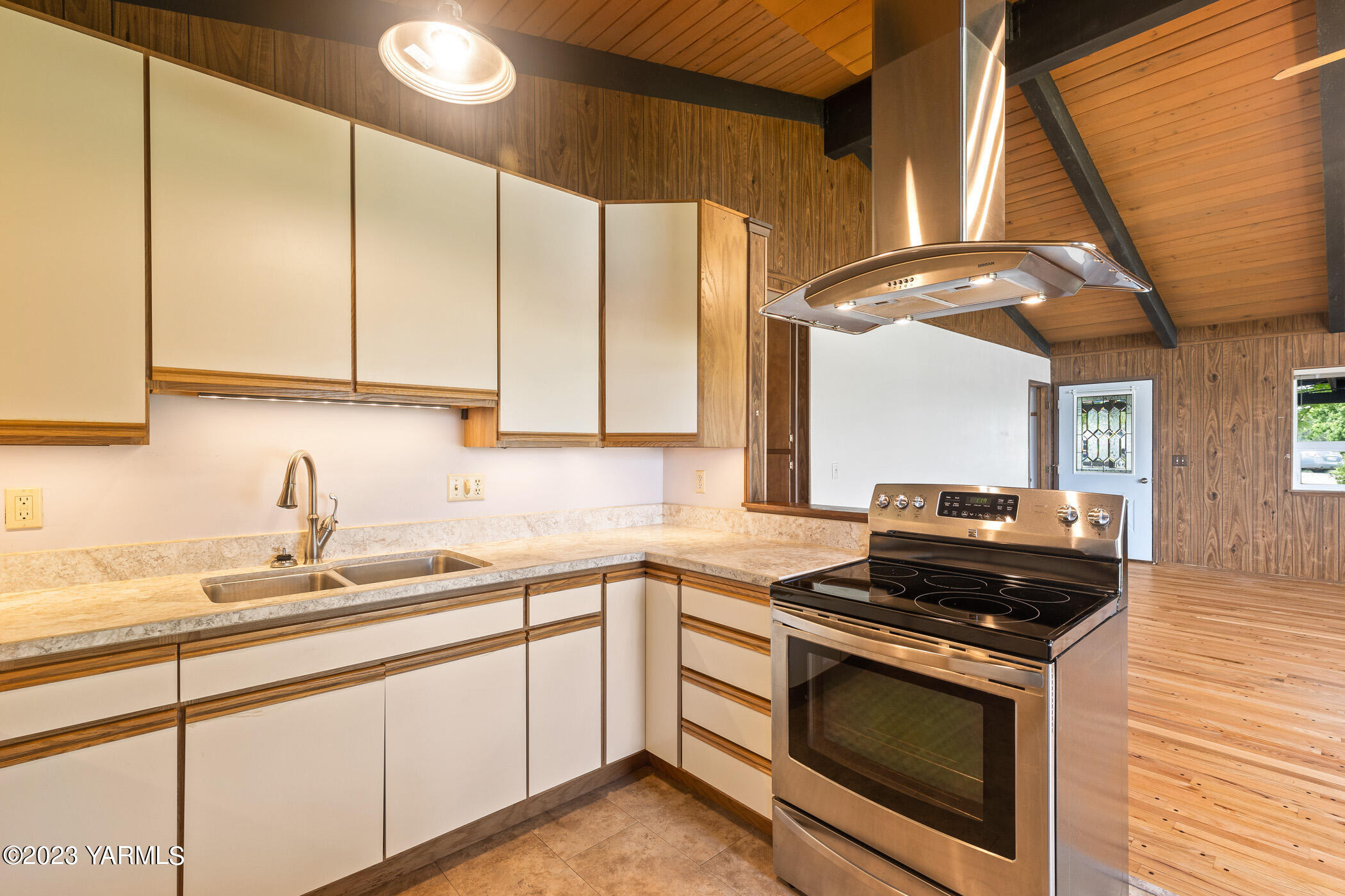 250 Bagley Road Granger, WA 98932 - Photo 8 of 23 a kitchen with stainless steel appliances granite countertop a sink a stove and a microwave