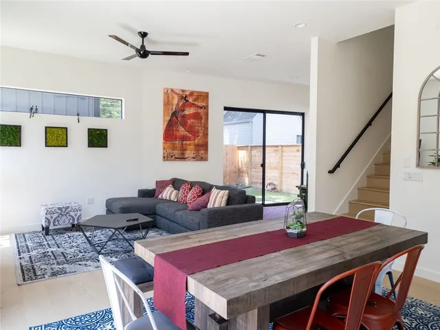 a living room with furniture and window