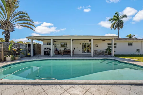 a view of an outdoor space and swimming pool