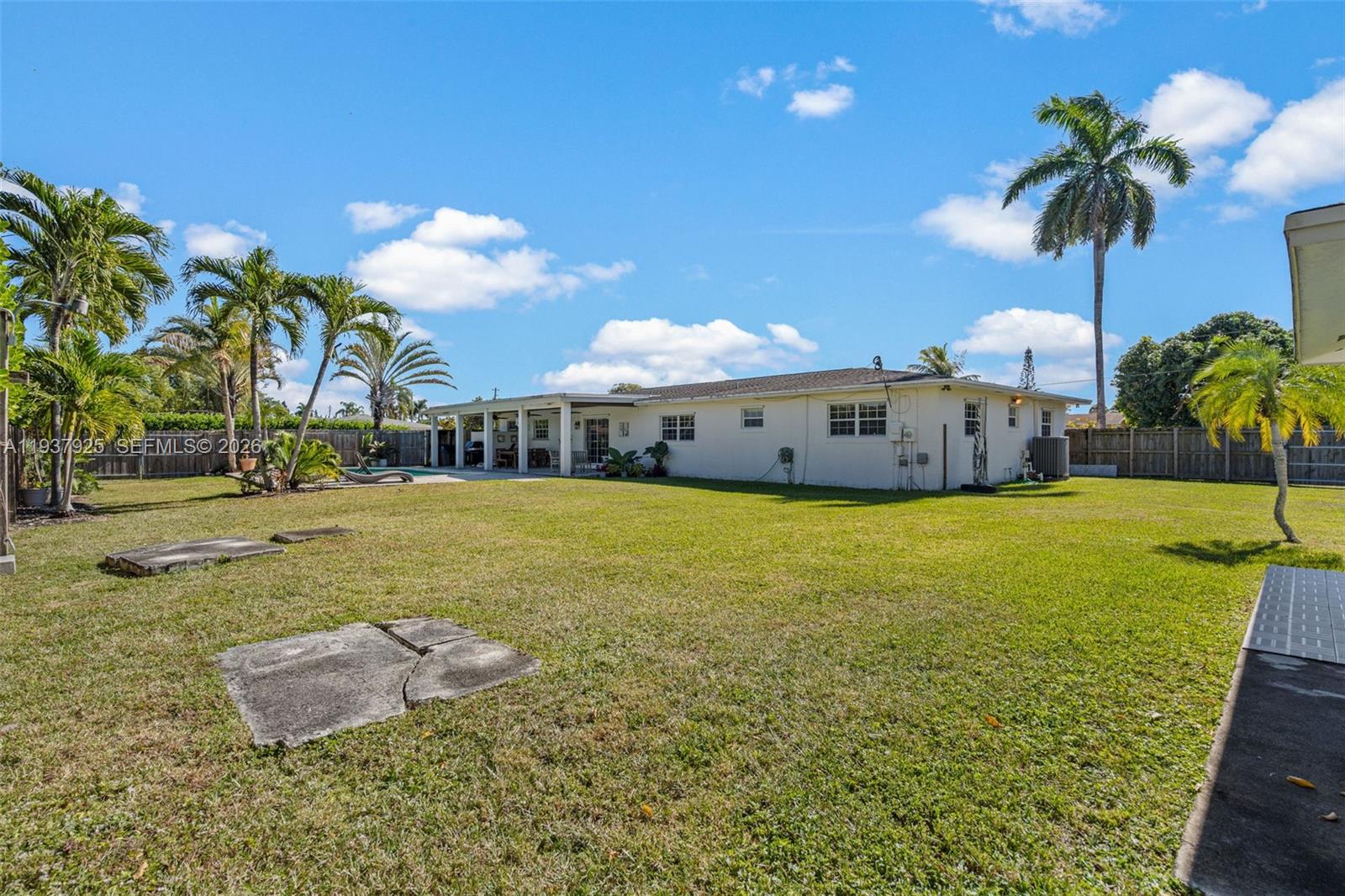 12805 Southwest 193rd Terrace Miami, FL 33177 - Photo 15 of 61 a view of an outdoor space and swimming pool