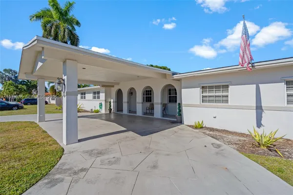 a front view of a house with a garage