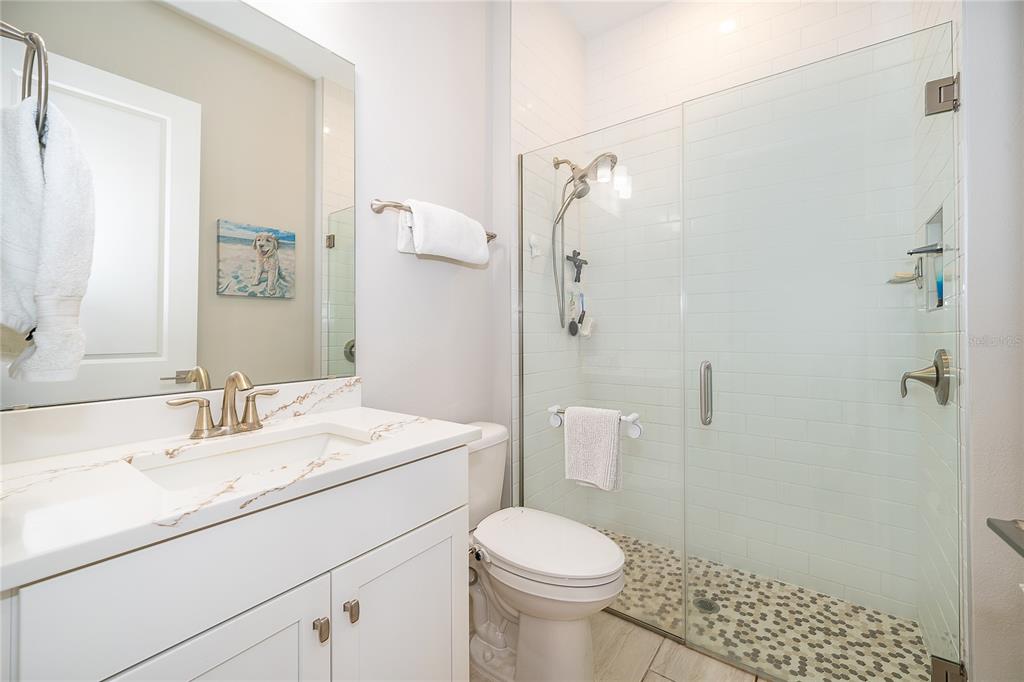 16033 Volterra Point Bella Collina, FL 34756 - Photo 12 of 54 a bathroom with a sink toilet and shower