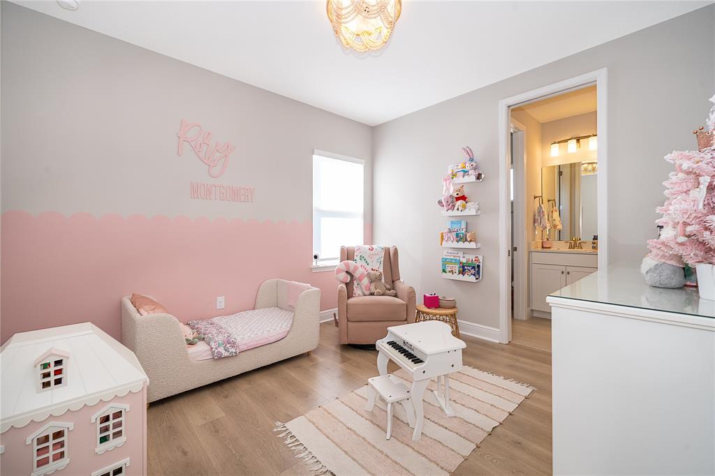 16033 Volterra Point Bella Collina, FL 34756 - Photo 24 of 54 a bedroom with furniture and a window