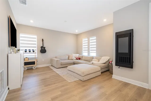 a kitchen with stainless steel appliances a refrigerator and a sink
