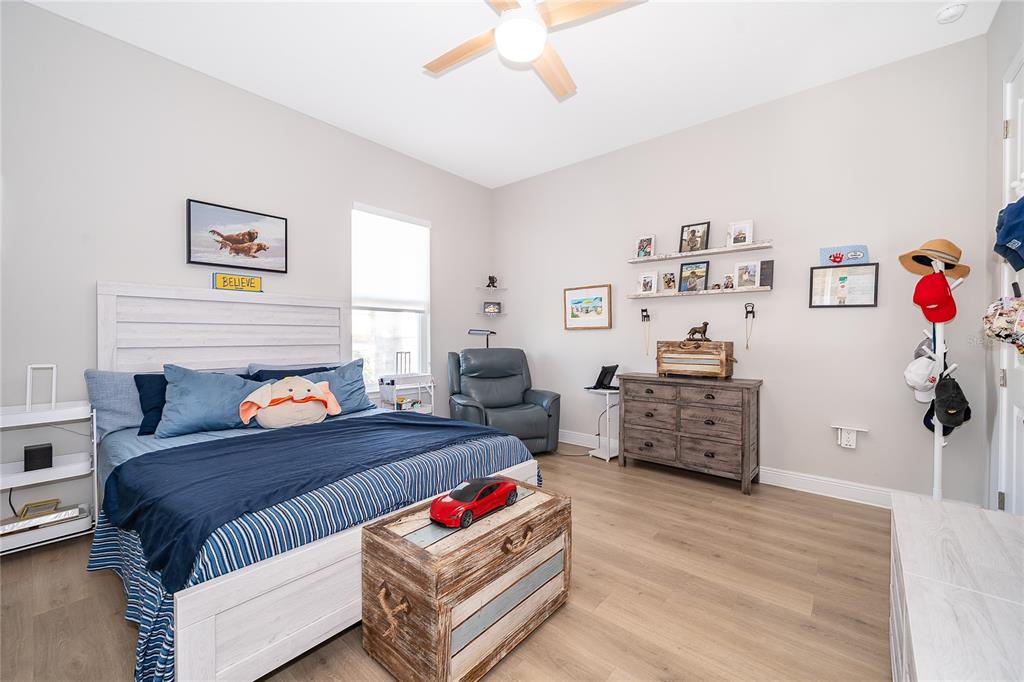 16033 Volterra Point Bella Collina, FL 34756 - Photo 9 of 54 a bedroom with furniture and a bed