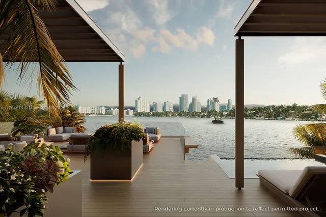 a view of a pool patio and outdoor kitchen