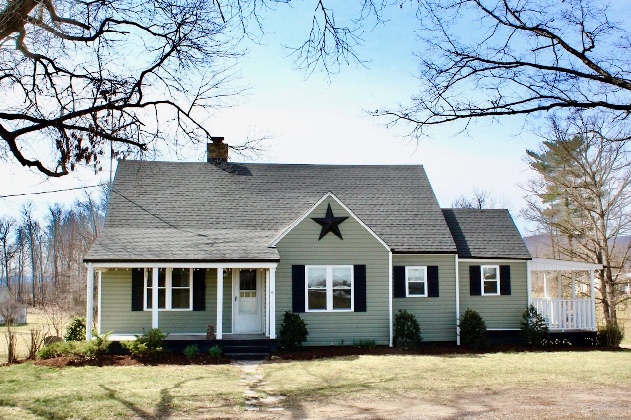 8862 Community Center Road Bridgewater, VA 22812 - Photo 1 of 29 front view of a house with a yard