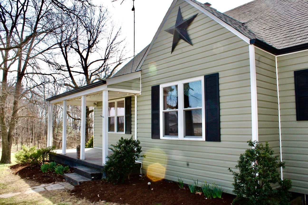 8862 Community Center Road Bridgewater, VA 22812 - Photo 13 of 29 a view of a house with a yard and potted plants