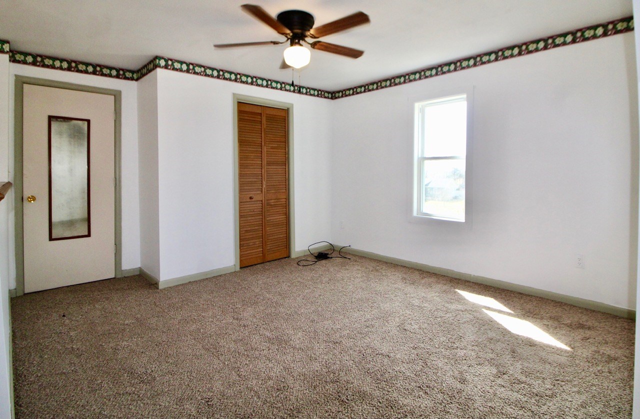 8862 Community Center Road Bridgewater, VA 22812 - Photo 23 of 29 a view of an empty room with a window