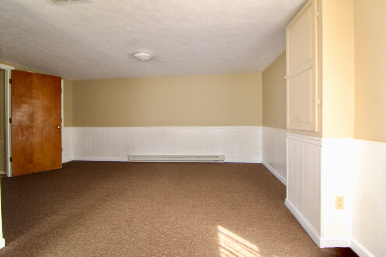 8862 Community Center Road Bridgewater, VA 22812 - Photo 26 of 29 a view of an empty room with wooden floor