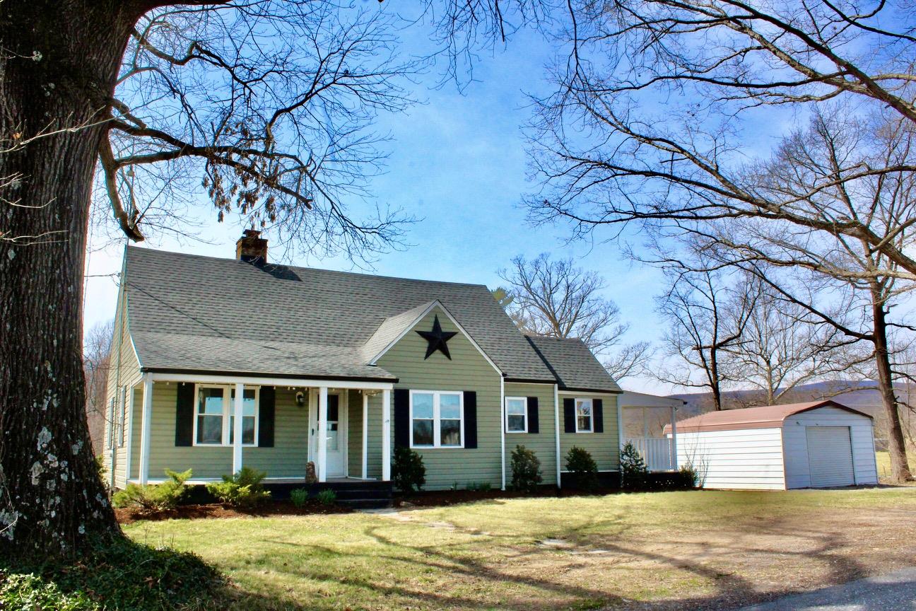 8862 Community Center Road Bridgewater, VA 22812 - Photo 3 of 29 a front view of a house with a yard