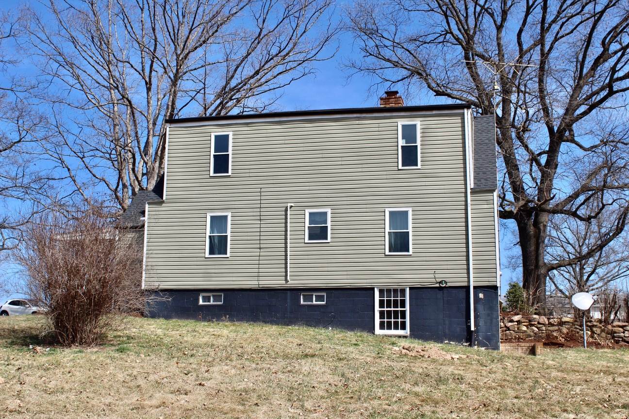 8862 Community Center Road Bridgewater, VA 22812 - Photo 7 of 29 a front view of a house with a yard