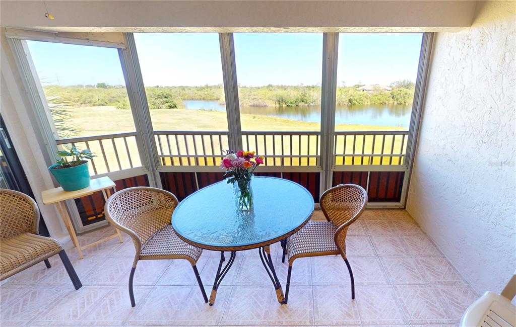 175 Kings Highway, Unit 736 Punta Gorda, FL 33983 - Photo 22 of 29 a living room with furniture and a window