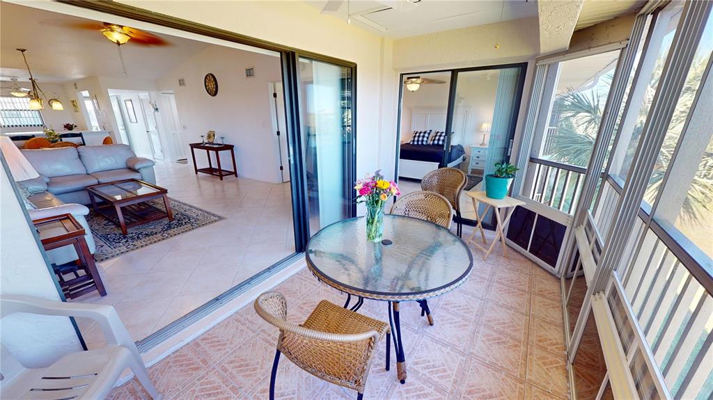 175 Kings Highway, Unit 736 Punta Gorda, FL 33983 - Photo 23 of 29 a living room with furniture and a table