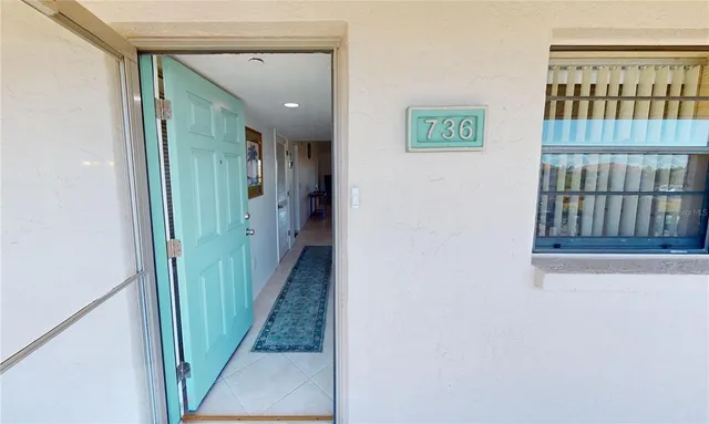 a view of hallway with stairs