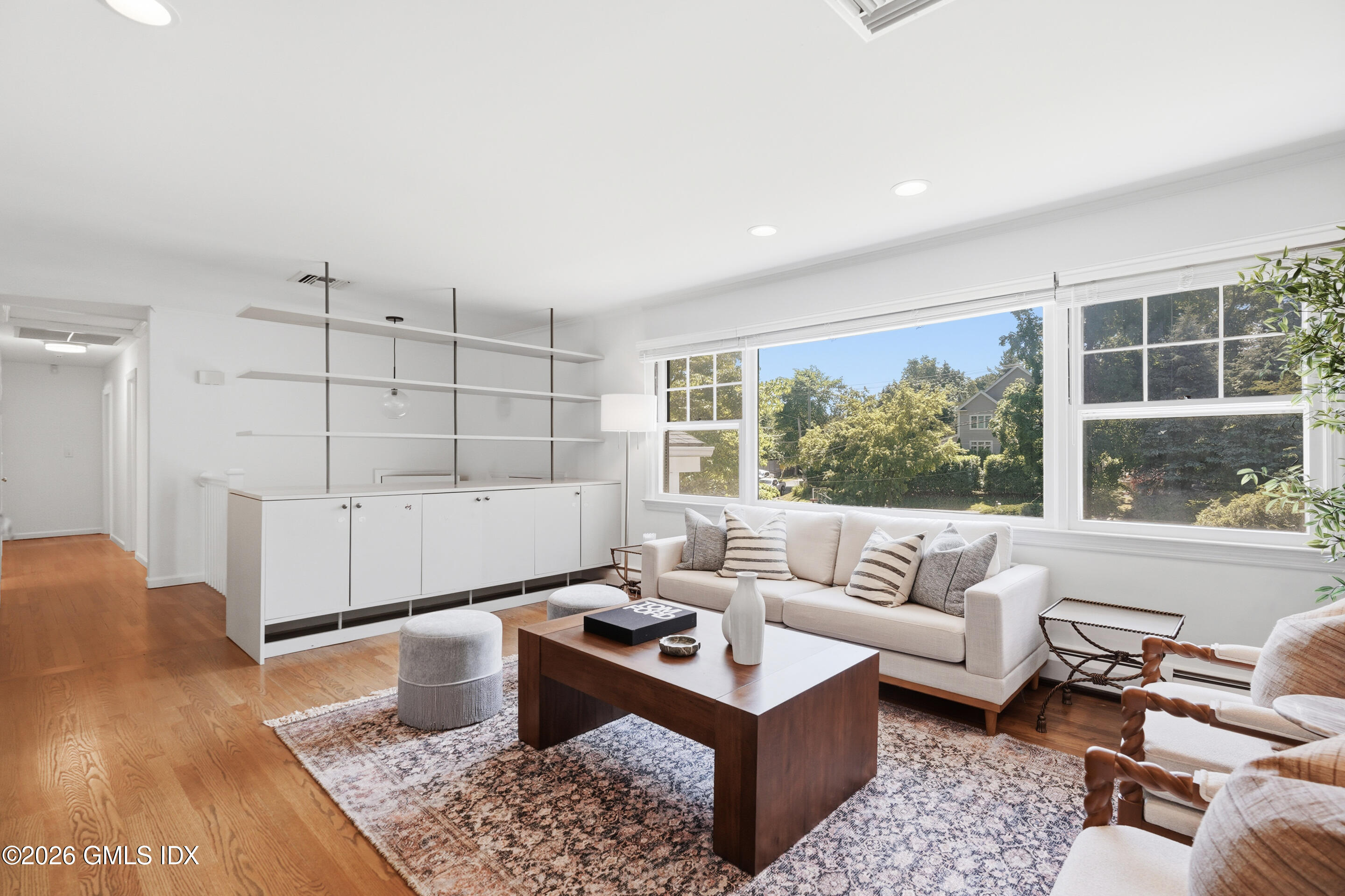 33 Sachem Road Greenwich, CT 06830 - Photo 3 of 35 a living room with furniture and a large window