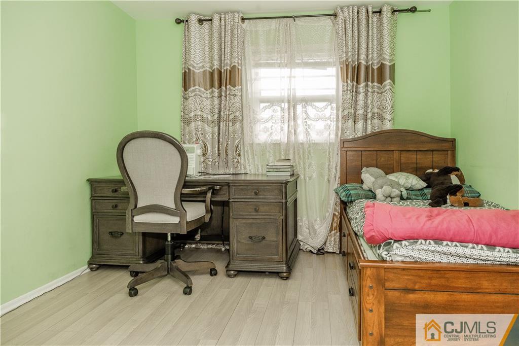 12 Crest Road East Brunswick, NJ 08816 - Photo 14 of 30 a view of a workspace with furniture and a window