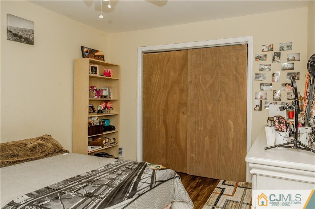 12 Crest Road East Brunswick, NJ 08816 - Photo 16 of 30 a bedroom with a bed and a window