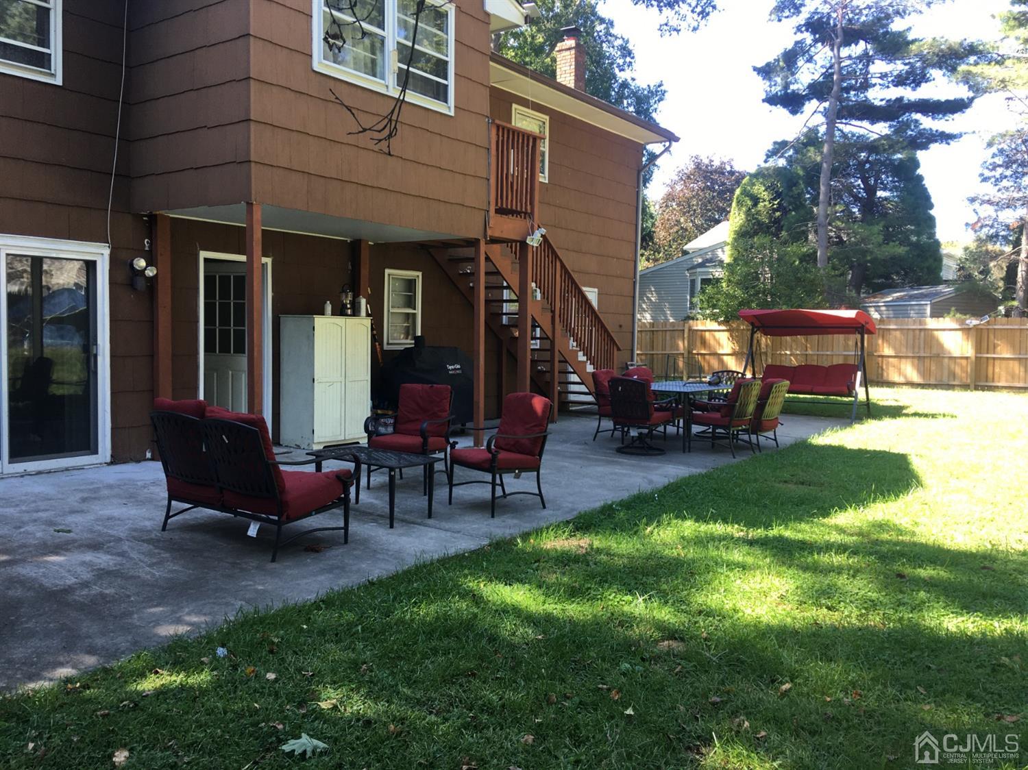 12 Crest Road East Brunswick, NJ 08816 - Photo 26 of 30 a view of a house with backyard tub and sitting area