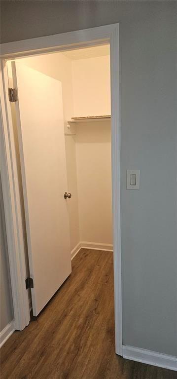 2810 Greenbower Court Atlanta, GA 30349 - Photo 13 of 24 an empty room with wooden floor and a window