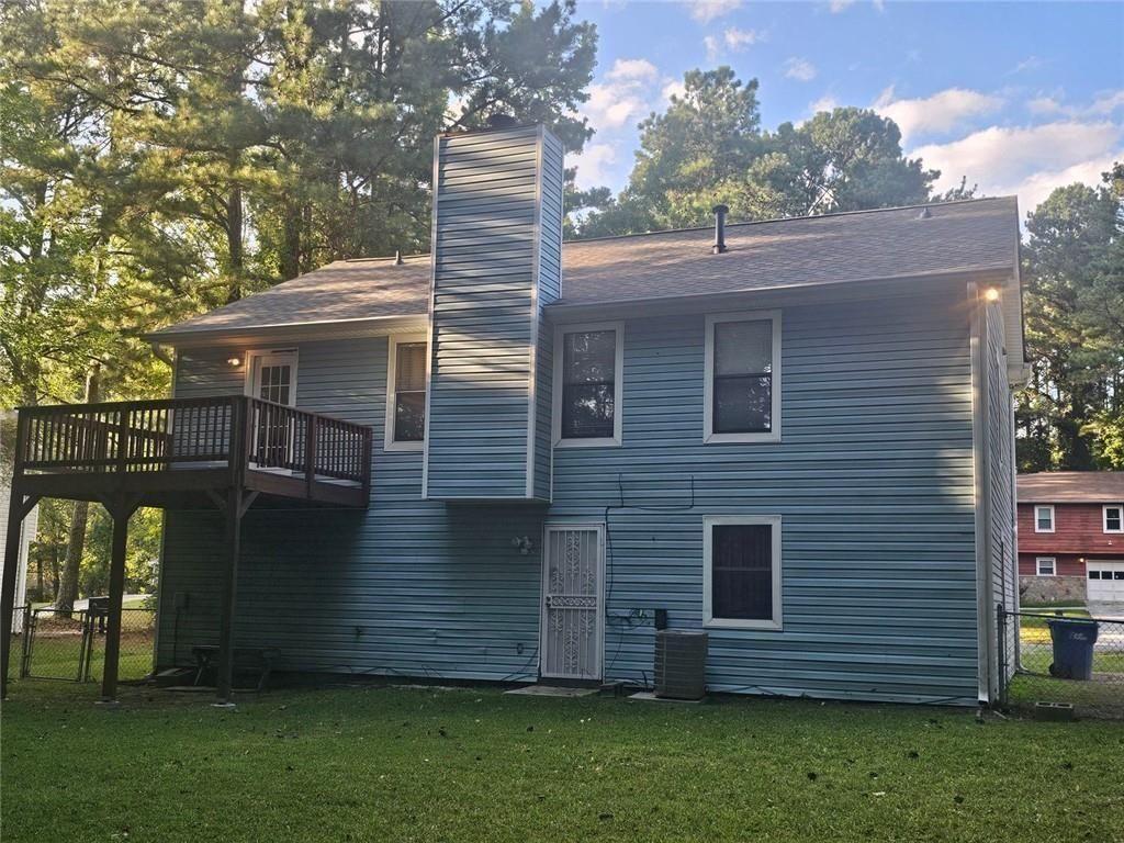 2810 Greenbower Court Atlanta, GA 30349 - Photo 2 of 24 a front view of a house with garden