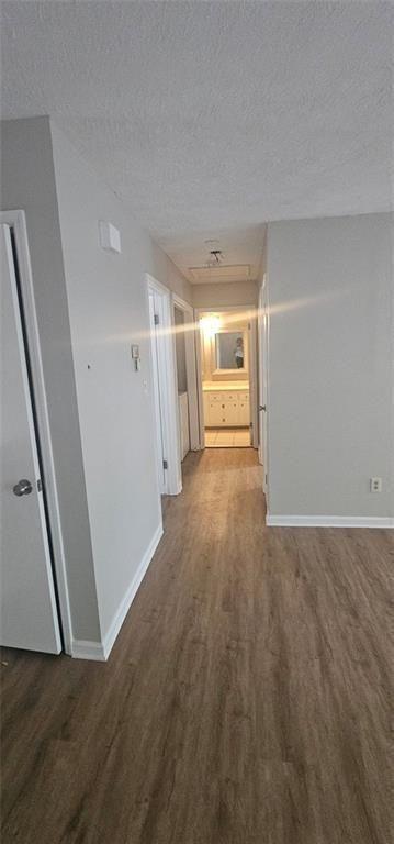 2810 Greenbower Court Atlanta, GA 30349 - Photo 8 of 24 a view of empty room with wooden floor