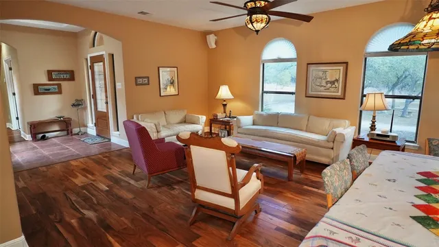 a living room with furniture and a window