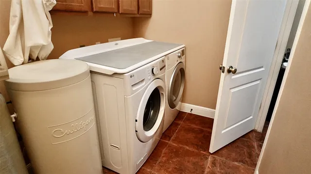 a living room with lots of furniture and a flat screen tv