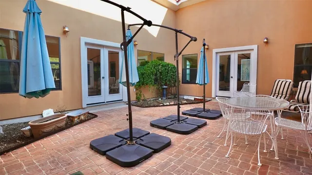 a view of a lobby with chair and tables