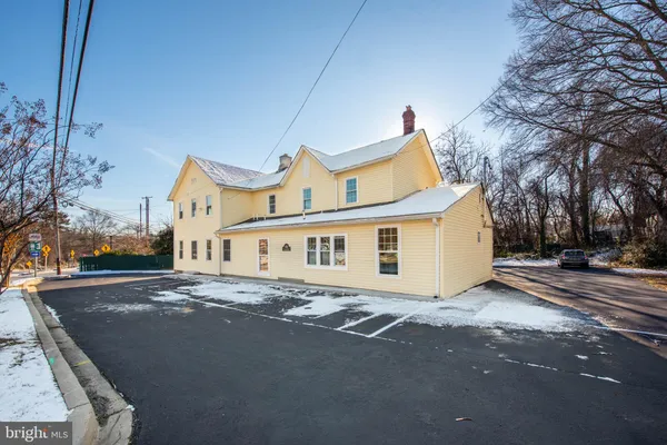 a view of a house with a street