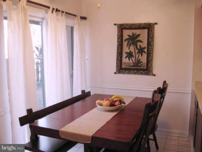 1321 Northgate Square Reston, VA 20190 - Photo 4 of 27 Light-Filled Dining Room