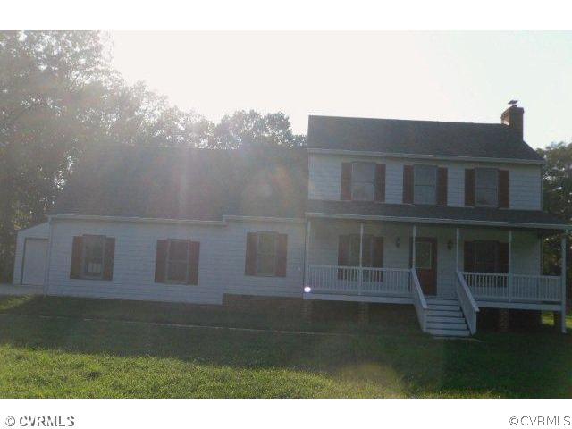 12330 Walkes Quarter Road Chesterfield, VA 23838 - Photo 1 of 1 a front view of a house with a garden