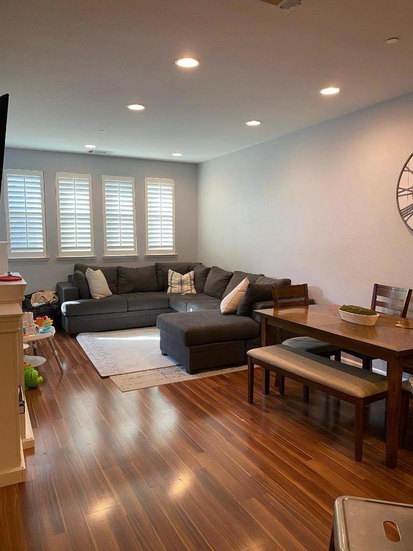 204 Sullivan Way Hayward, CA 94541 - Photo 5 of 8 a living room with furniture and wooden floor