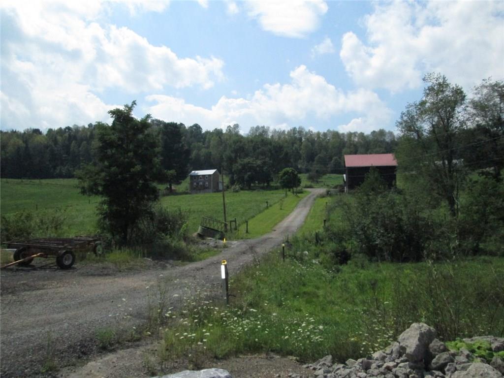 191 Adrian Sherrett Road Adrian, PA 16210 - Photo 1 of 24 A view from the road! 83 Acre Farm, Stream, Home, 40x40 bank barn, 60x30 Quonset Building, 22x40 detached garage and smoke house. Farm is set up into 11 different pasture areas with spring water for each area. All owned Oil, Gas and Mineral Rights will convey, 200,000 cuft of free gas and city water at the road!!