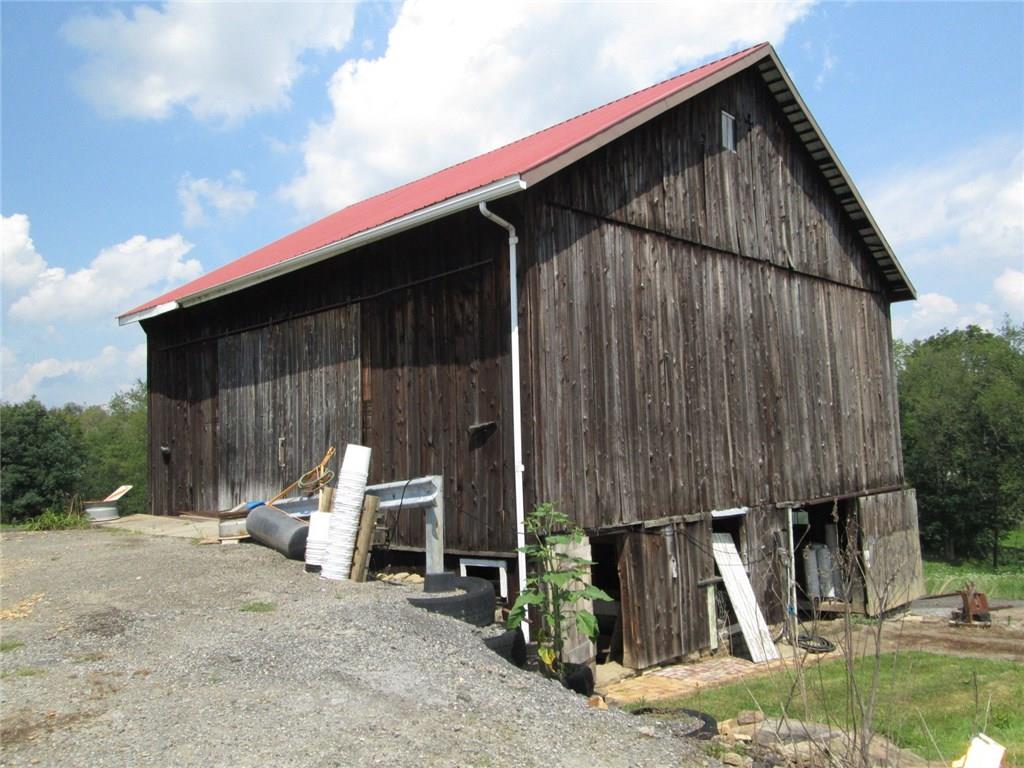 191 Adrian Sherrett Road Adrian, PA 16210 - Photo 14 of 24 The bank side of the bank barn. Notice the newer roof.