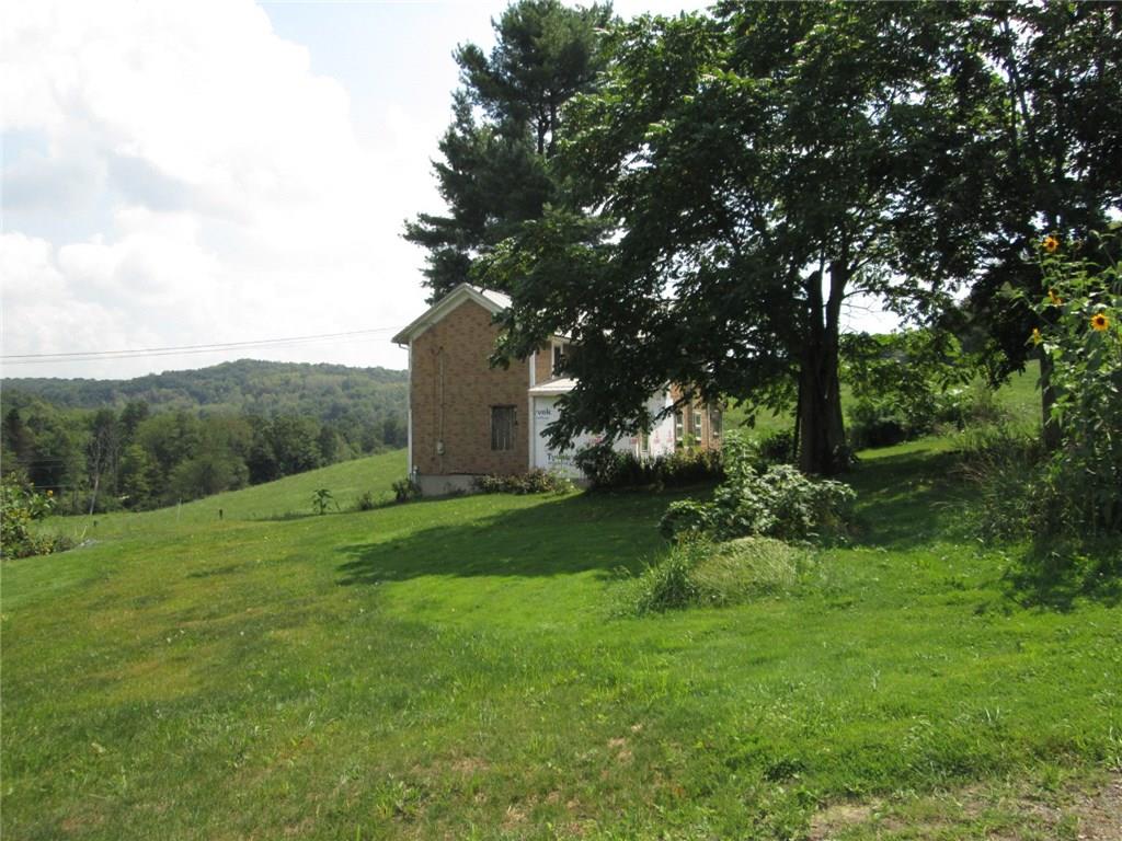 191 Adrian Sherrett Road Adrian, PA 16210 - Photo 7 of 24 A distant view of the home and surrounding rolling countryside.