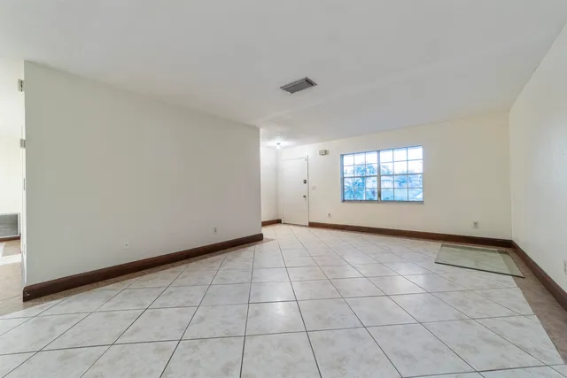a view of a kitchen with a sink and a stove top oven