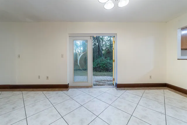 a view of an empty room and window