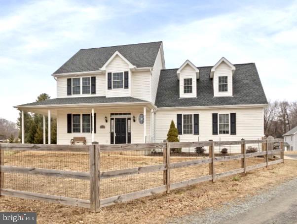 11055 Ransom Lane Bealeton, VA 22712 - Photo 2 of 45 a front view of a house with a yard