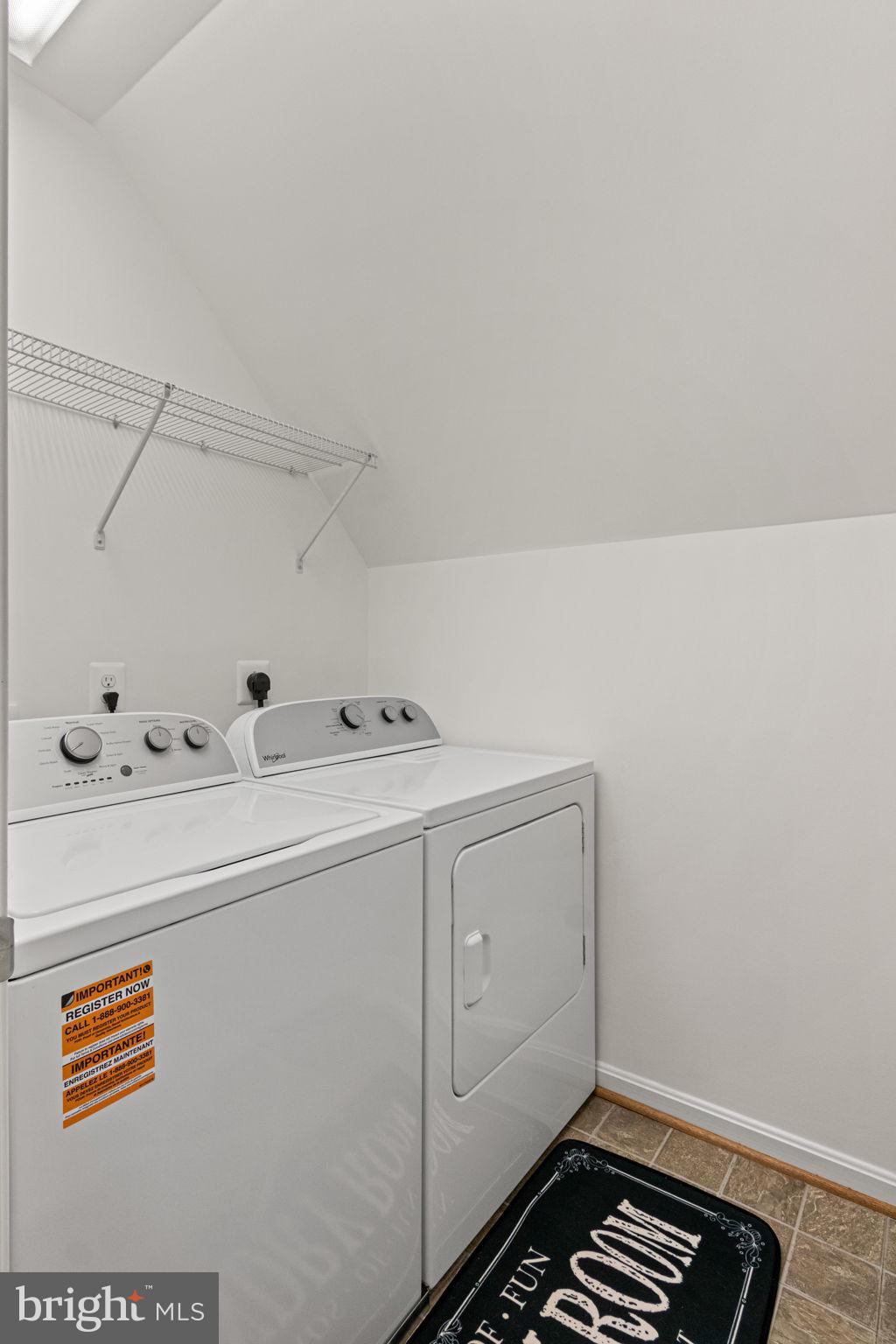 11055 Ransom Lane Bealeton, VA 22712 - Photo 24 of 45 a utility room with dryer and washer