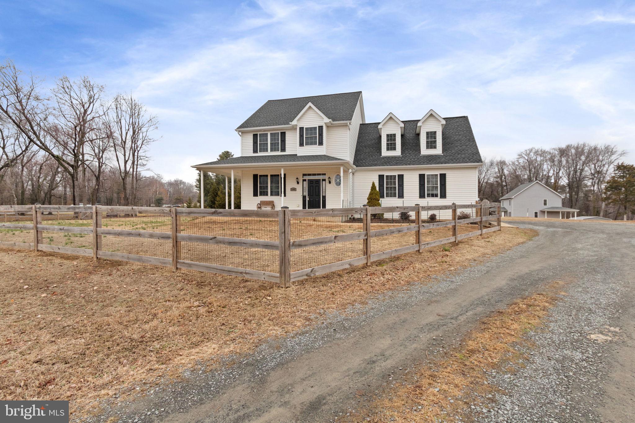 11055 Ransom Lane Bealeton, VA 22712 - Photo 3 of 45 a house view with a garden space