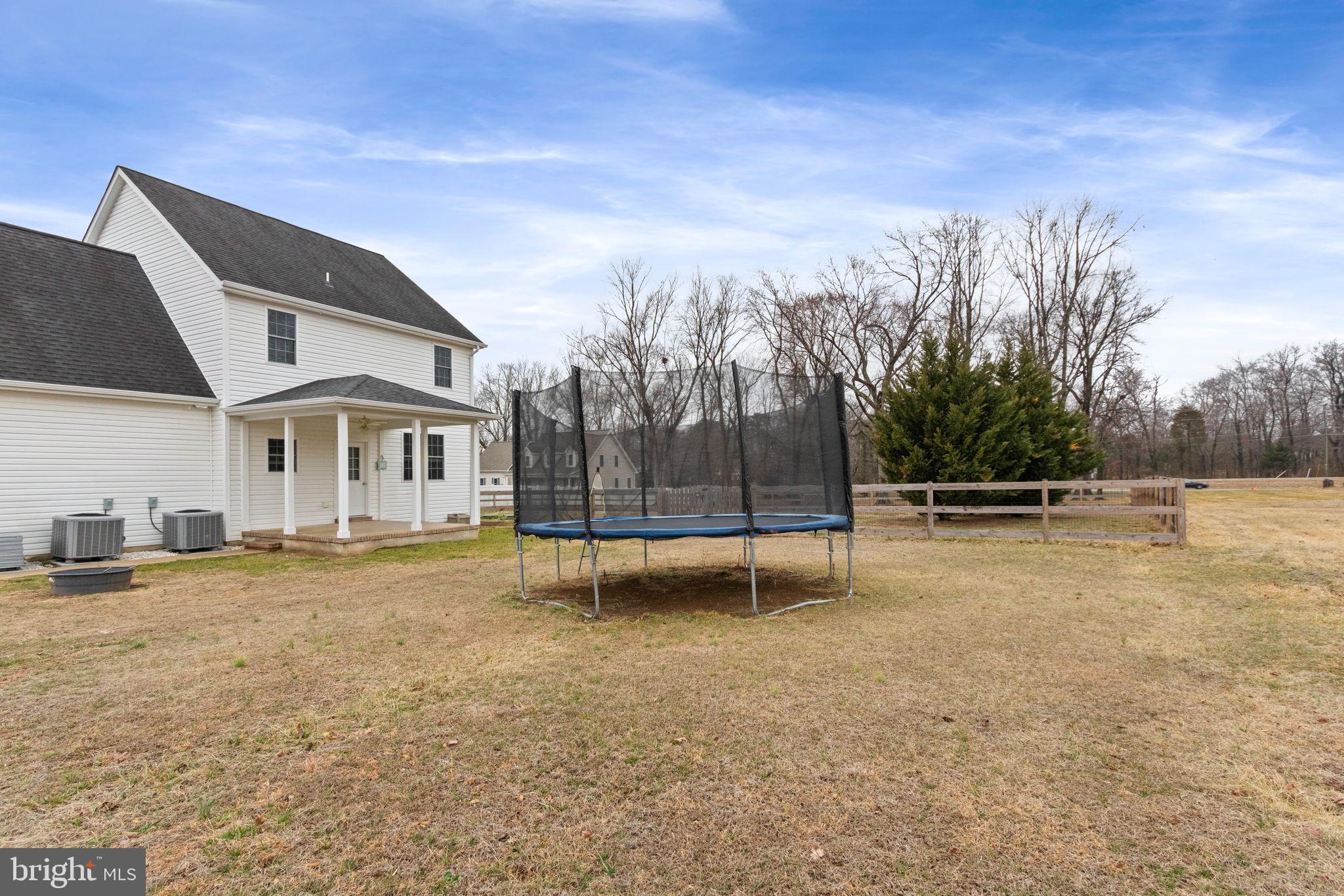 11055 Ransom Lane Bealeton, VA 22712 - Photo 41 of 45 a view of a house with a yard