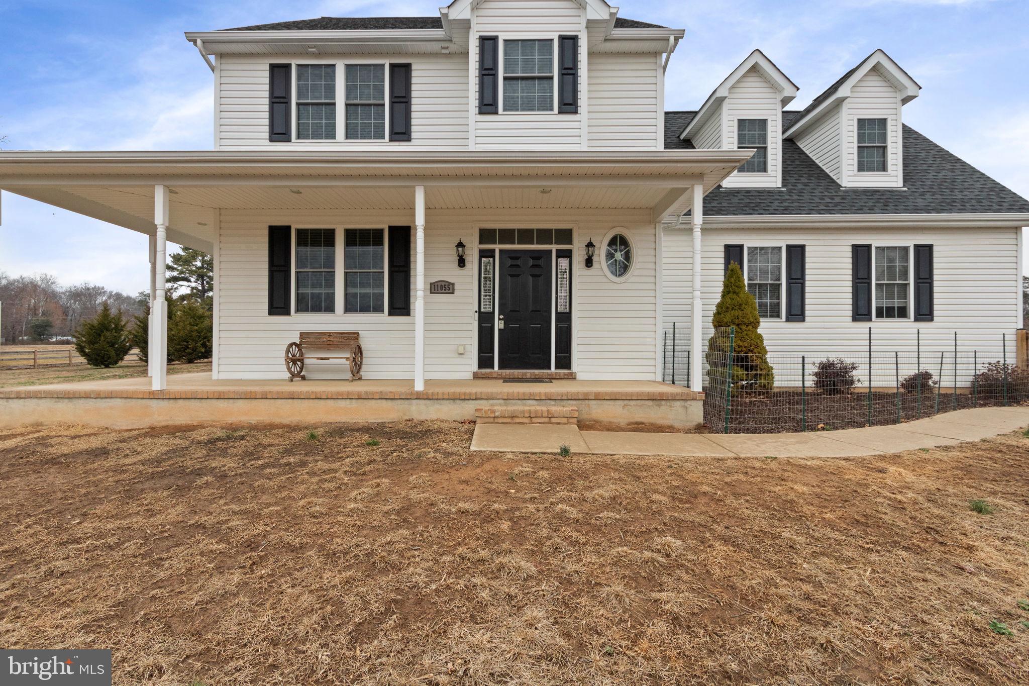 11055 Ransom Lane Bealeton, VA 22712 - Photo 5 of 45 a view of a house with a outdoor space