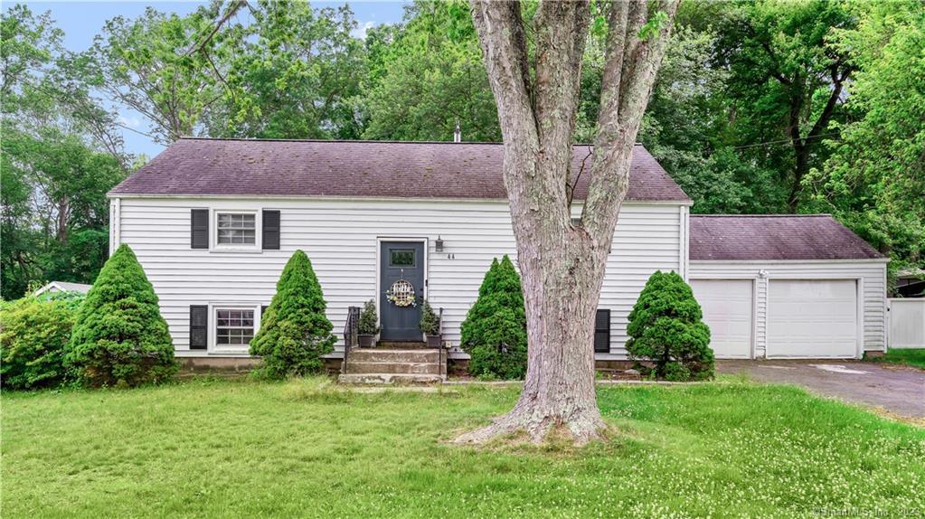 44 Alexander Road Milford, CT 06461 - Photo 1 of 1 front view of a house with a yard