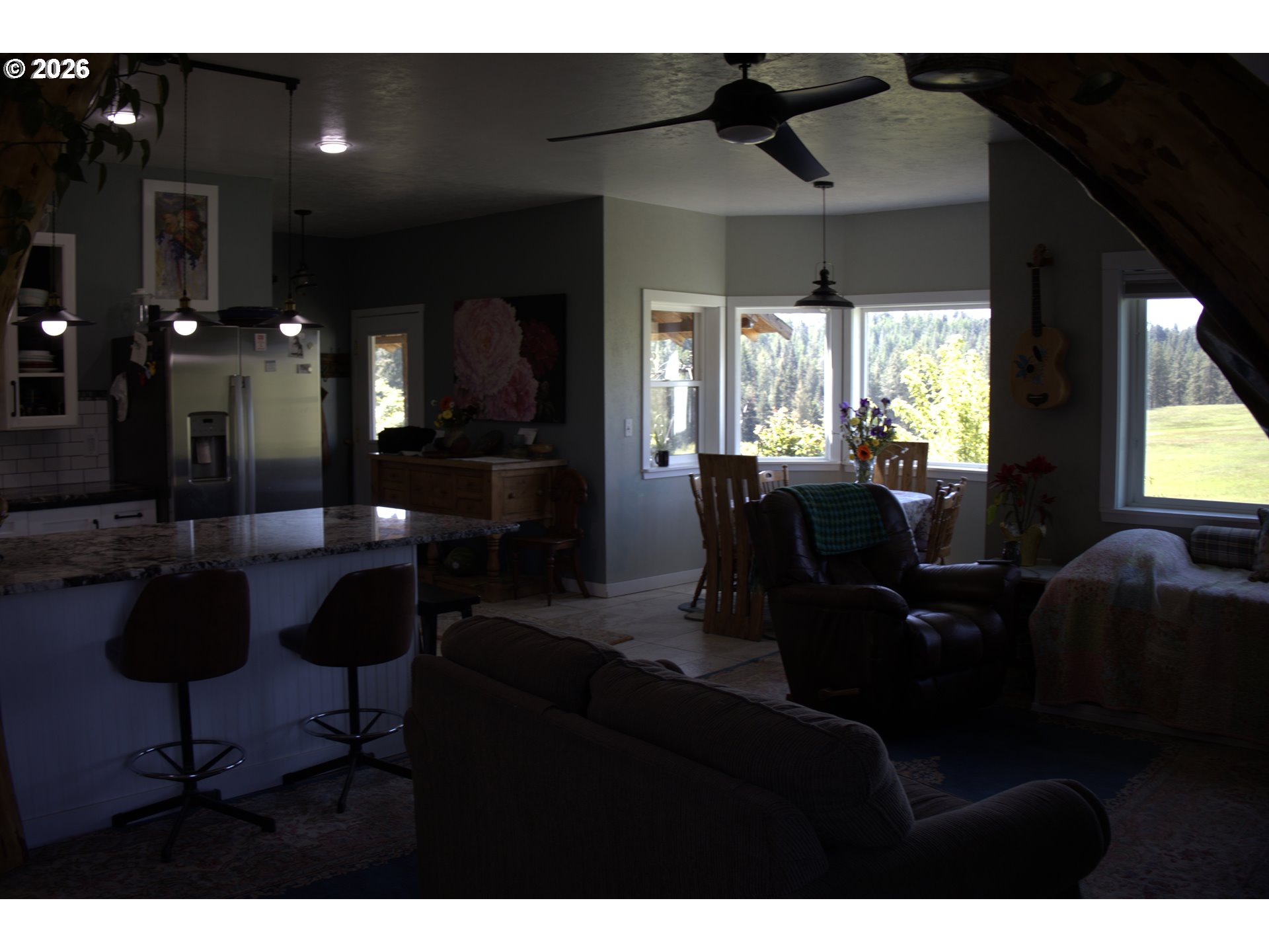 55821 Wildhorse Road Weston, OR 97886 - Photo 21 of 33 a living room with furniture and a large window